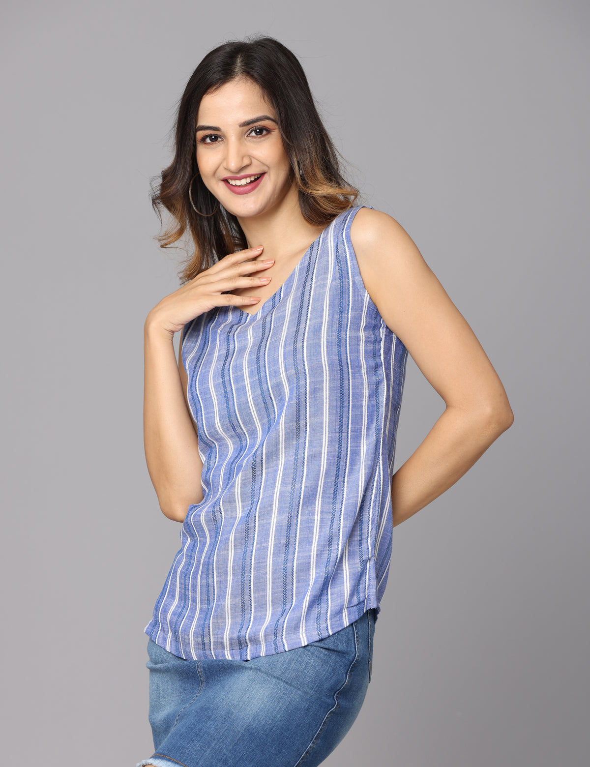 Shop this essential blue striped sleeveless top online and elevate your casual look